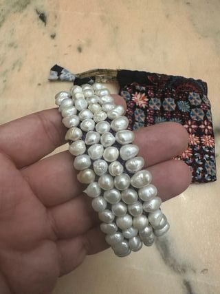 Pulsera artesanal 100 perlas naturales