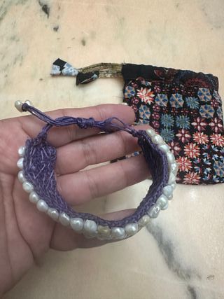 Pulsera artesanal 100 perlas naturales