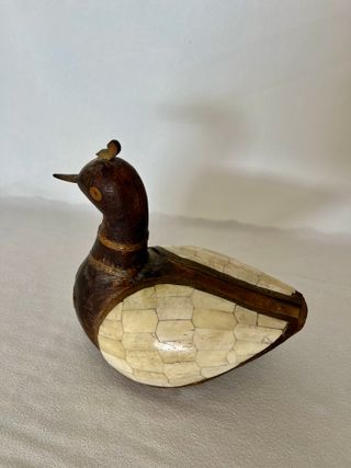 Statuetta antica in legno e osso