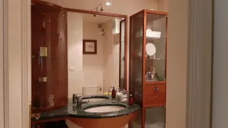 Mueble de baño madera y mármol verde