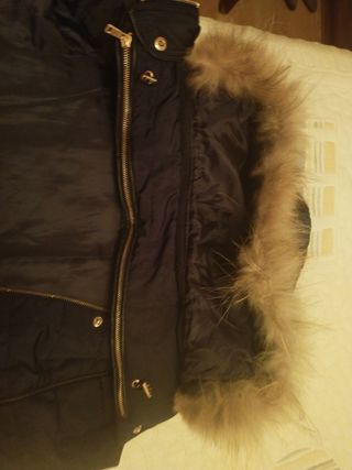 Chaleco impermeable con capucha y pelo