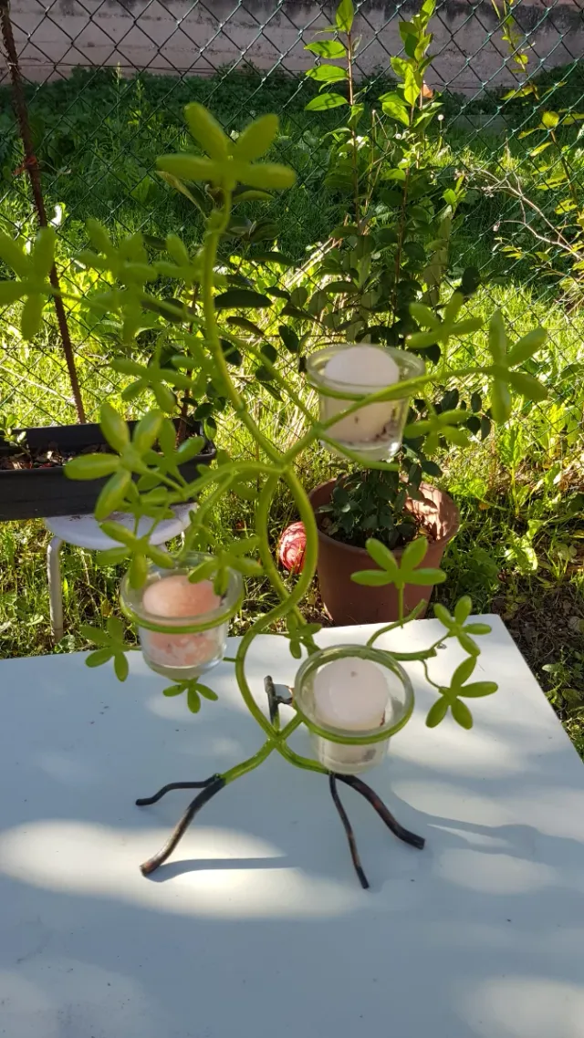 Portavelas aromático de metal y cristal