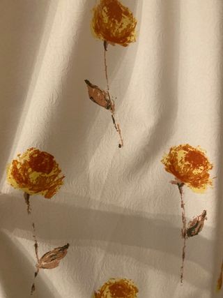 Juego textil dormitorio beige y naranja