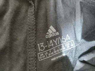 Pantalón corto deportivo Adidas azul talla 13-14