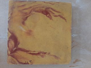 Baldosa hidráulica naranja y roja 20x20