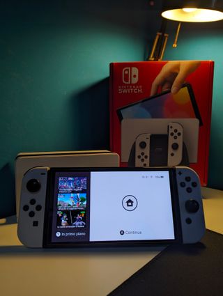 Nintendo Switch OLED + SD 512GB + Pellicole +Gioco