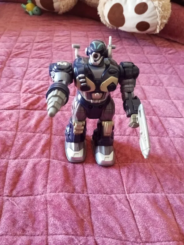 Robot de juguete azul y gris,venta en mano
