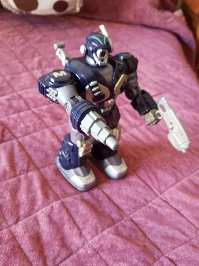 Robot de juguete azul y gris,venta en mano