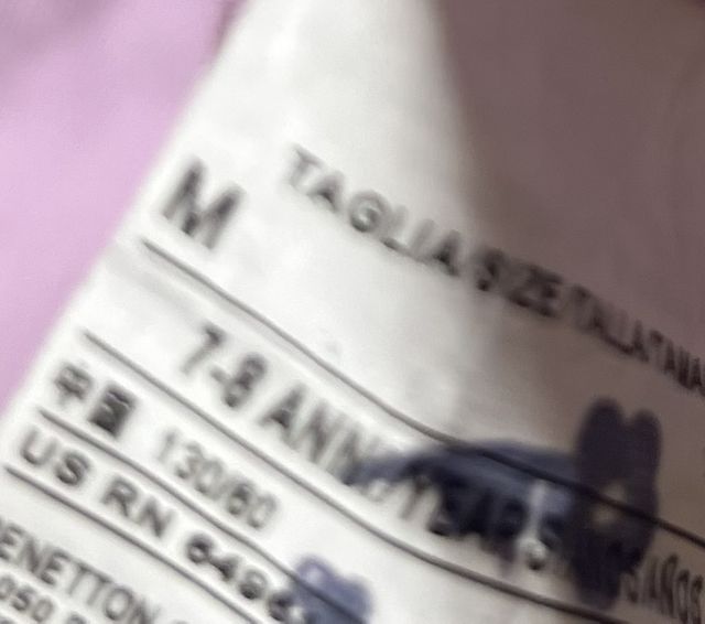 Chubasquero Benetton Lila 7 años