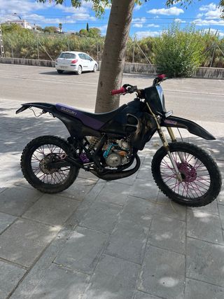 se vende suzuki rmx o se cambia por moto de cross