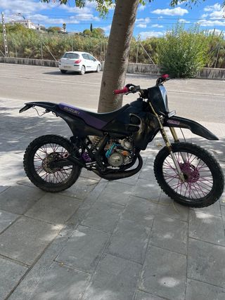 se vende suzuki rmx o se cambia por moto de cross