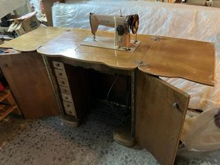 Máquina de coser Singer antigua “art deco”