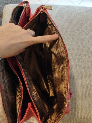 Borsa Moschino fucsia usata
Rovinati i manici foto