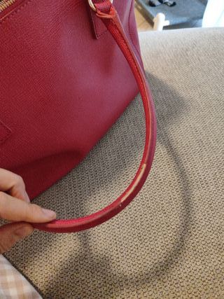 Borsa Moschino fucsia usata
Rovinati i manici foto