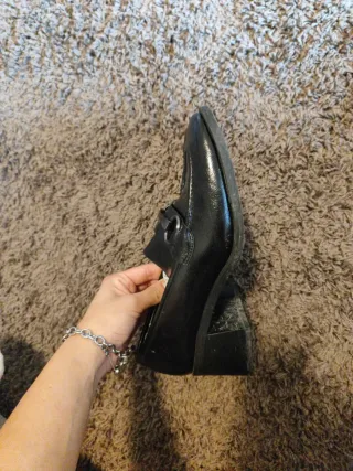 Mocassini neri con fibbia