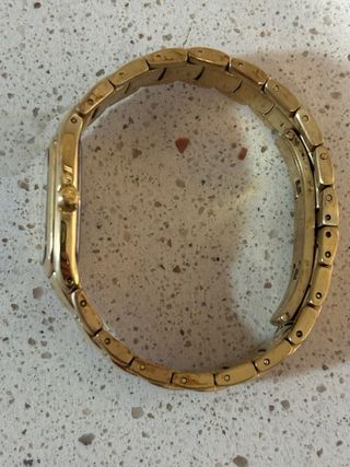 Reloj Lotus Dorado y Blanco