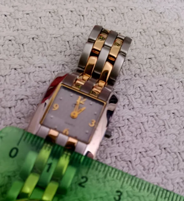 Reloj lotus quartz acero inoxidable  bañado en oro