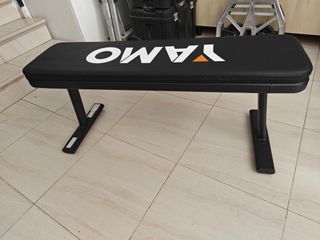 Banco de pesas, barra dominadas y mancuernas