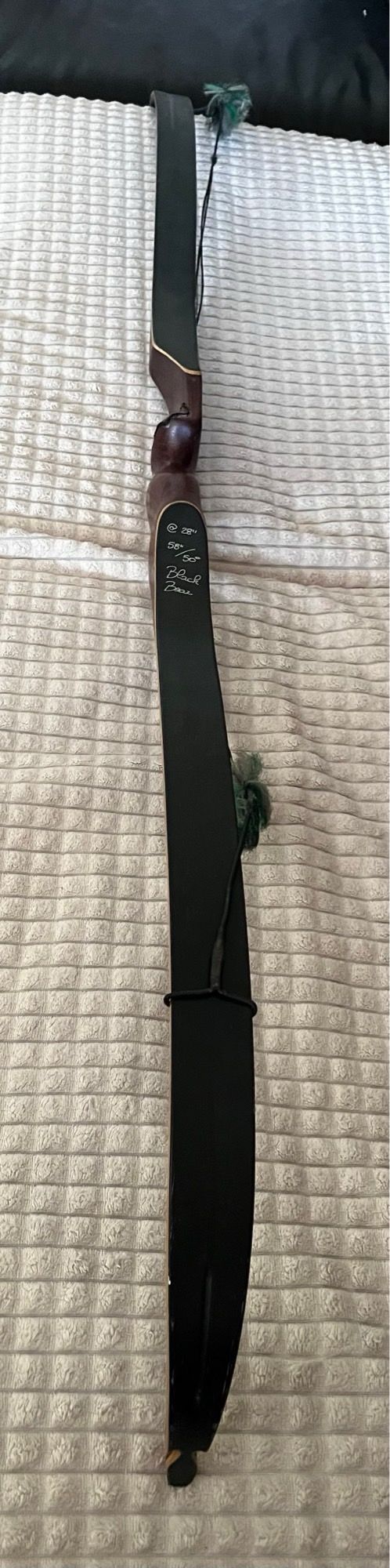 Arco recurvado tradicional monoblock