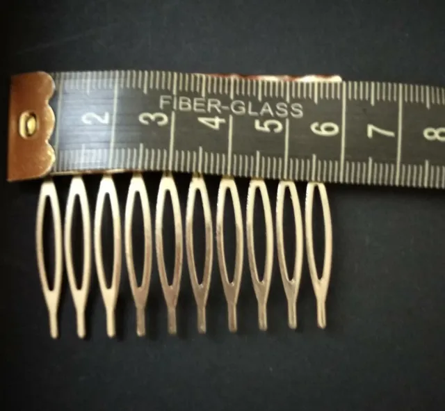 Juego 2 peinetas y 1 broche dorado