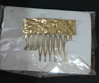 Juego 2 peinetas y 1 broche dorado