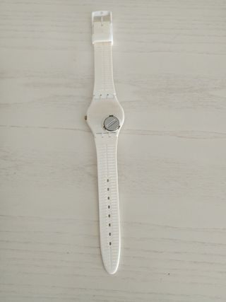 Reloj Swatch Blanco y Dorado