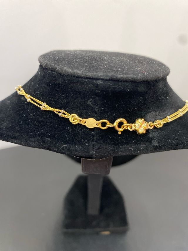 Cadena oro 18k doble con detalles oro blanco
