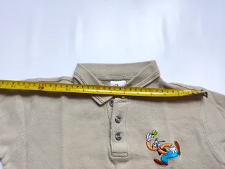 Polo beige con Goofy
