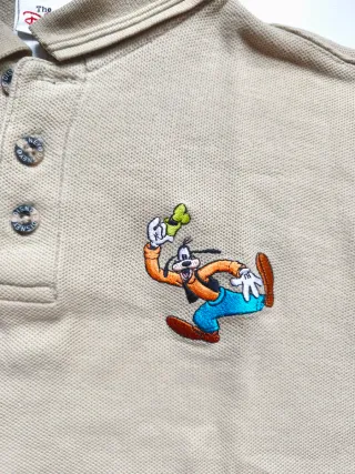 Polo beige con Goofy