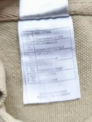 Polo beige con Goofy