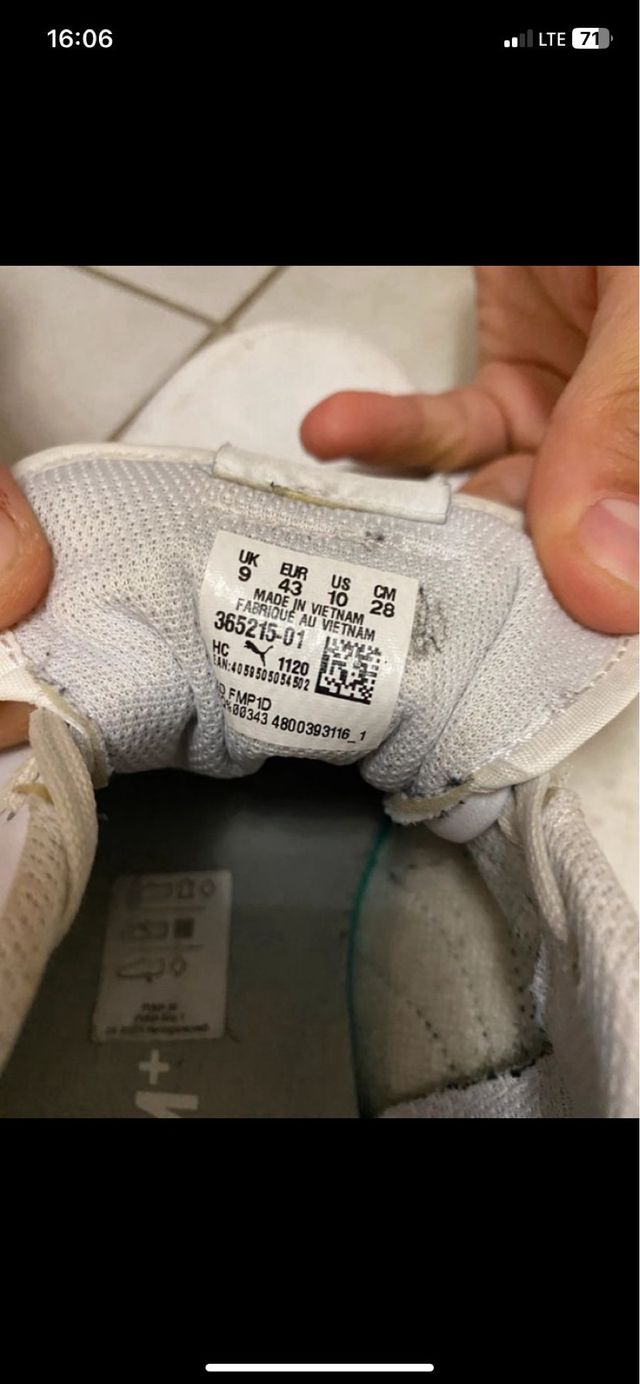 Scarpe Puma bianche e nere