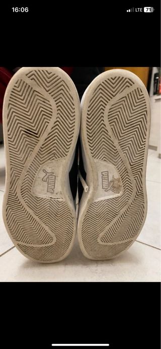 Scarpe Puma bianche e nere