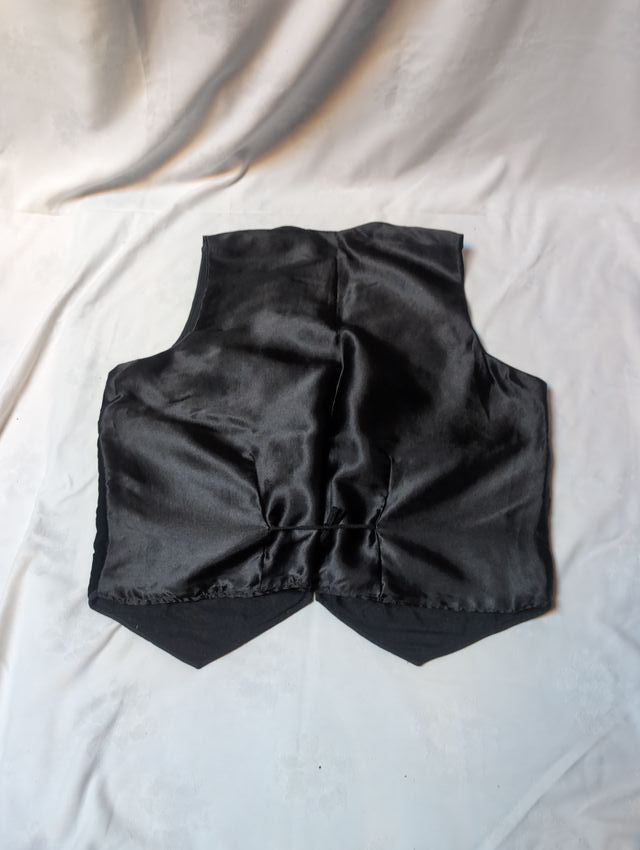 Colete bordado preto e castanho