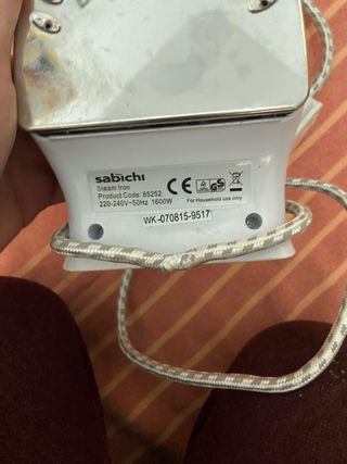 Plancha eléctrica azul y blanca