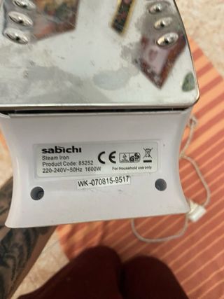 Plancha eléctrica azul y blanca