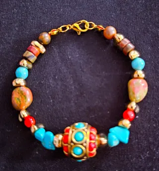 Pulsera mujer con abalorios dorados y turquesa