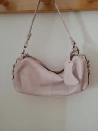 Bolso rosa de mano