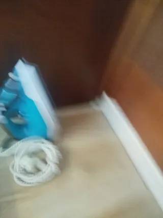 Tabla de planchar con funda y plancha