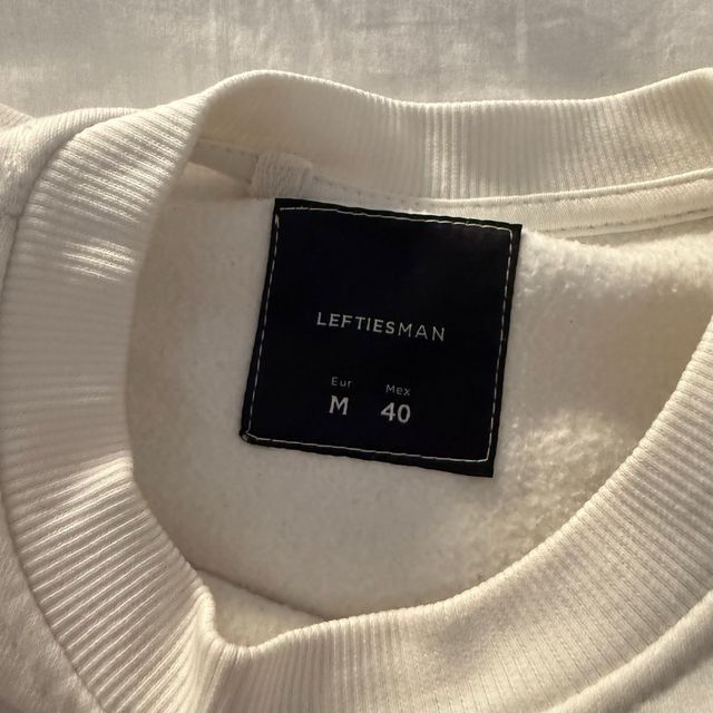 Sudadera sin capucha beige y blanca