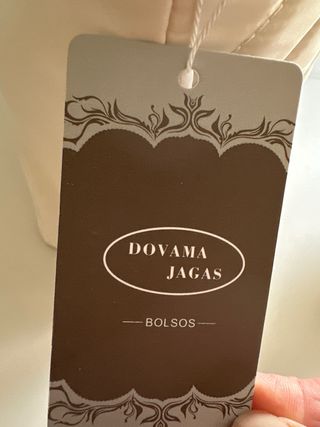 Bolso impermeable beige y negro