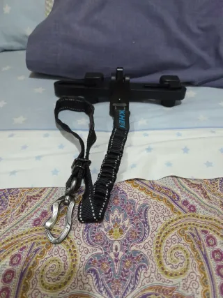 Gancho practico  para  llevar al perro en el coche