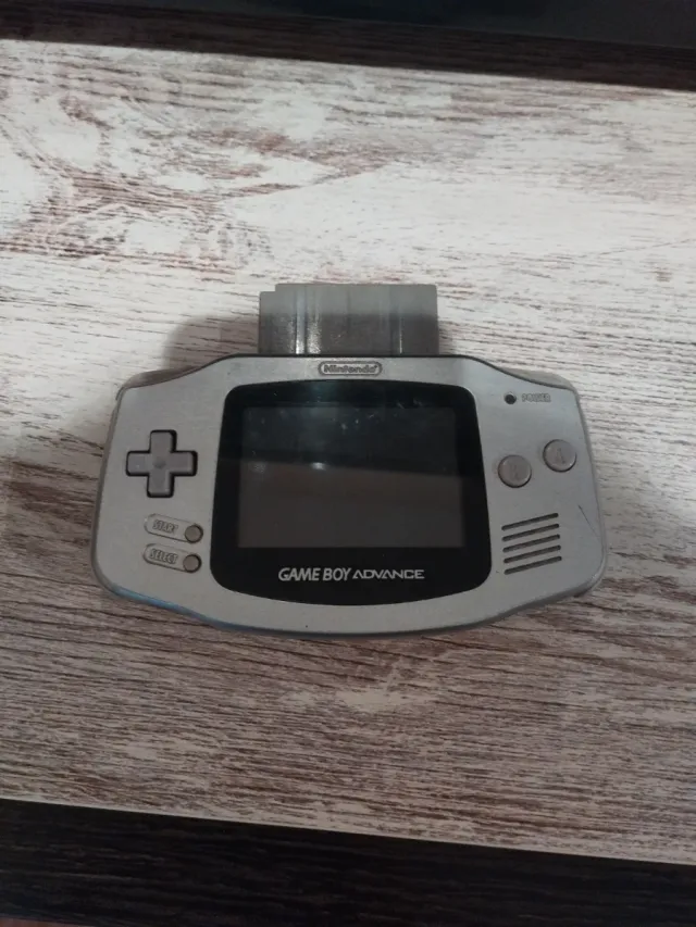 Nintendo Game Boy Advance Gris con el super 32