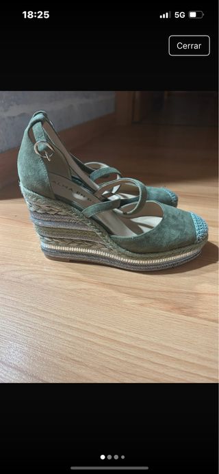 Zapatillas Alma en Pena verde cuña.
sin uso
