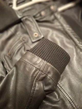 CHAQUETA DE NAPA NEGRA CON CREMALLERAS J.SIMORRA