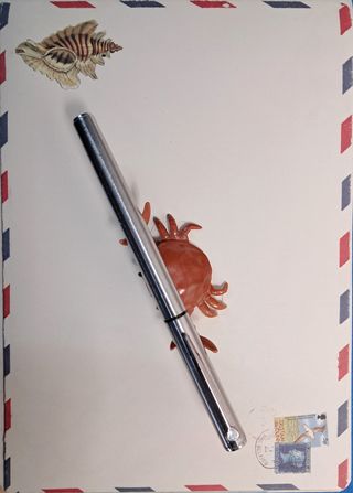 Pluma estilográfica Universal plateada