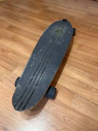 Longboard Oxelo. Como nuevo, pero manchado.