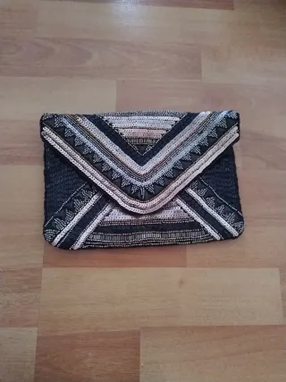 Bolso de fiesta negro y dorado