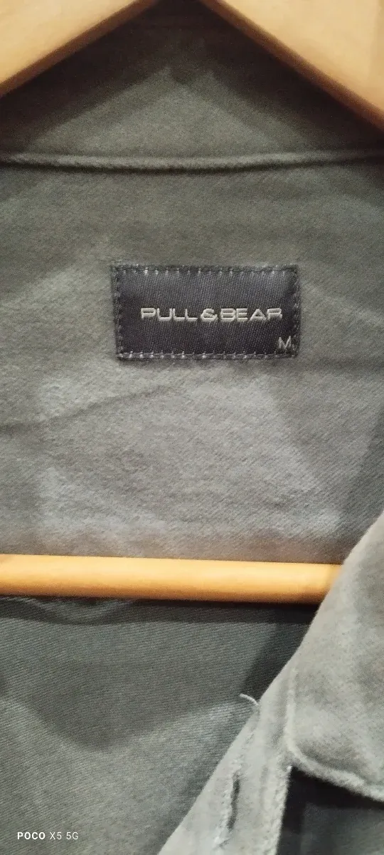 Chaqueta verde con bolsillos