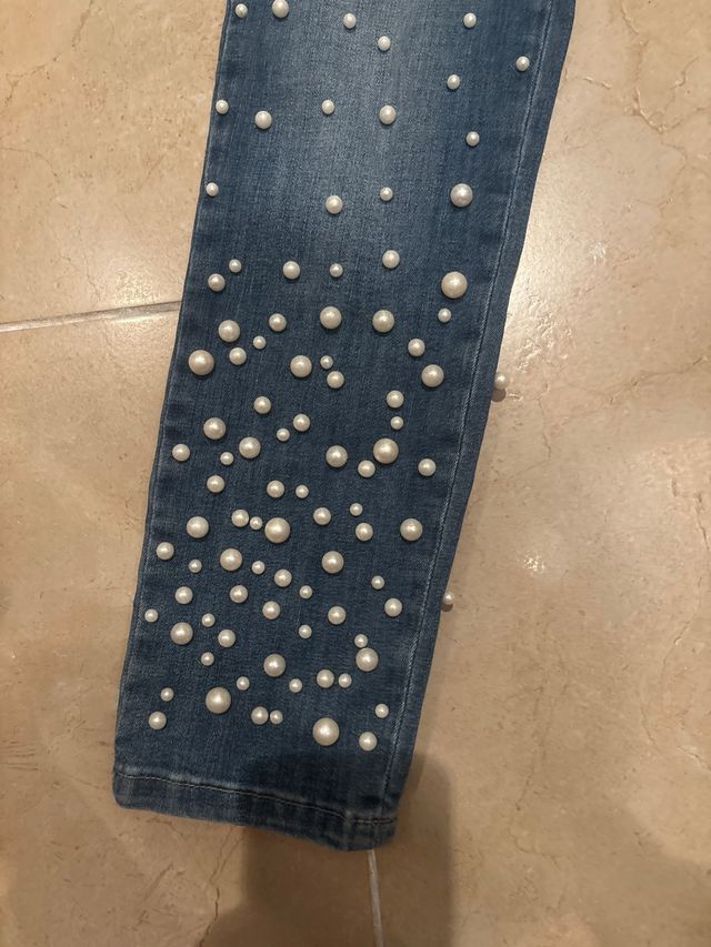 Tejanos Twin Set con perlas