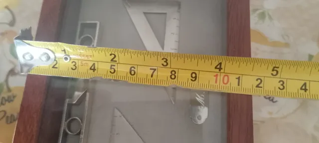 Quadretto decorativo con strumenti in argento